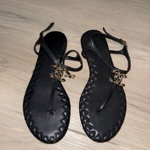 CHANEL Black Sandals with Gold Accents